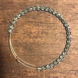 Alex and Ani gold, small blue bead bangle
